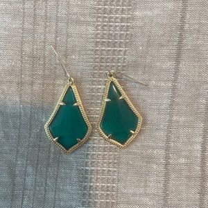 Kendra Scott earrings.